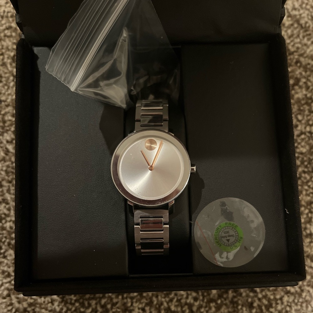 COPY - Movado bold series watch. Hardly used .comes with box !